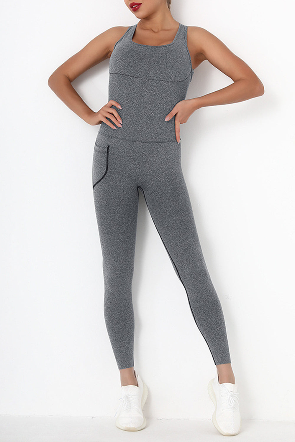 Female model wearing Active Jumpsuit Wide Strap Crisscross Gray