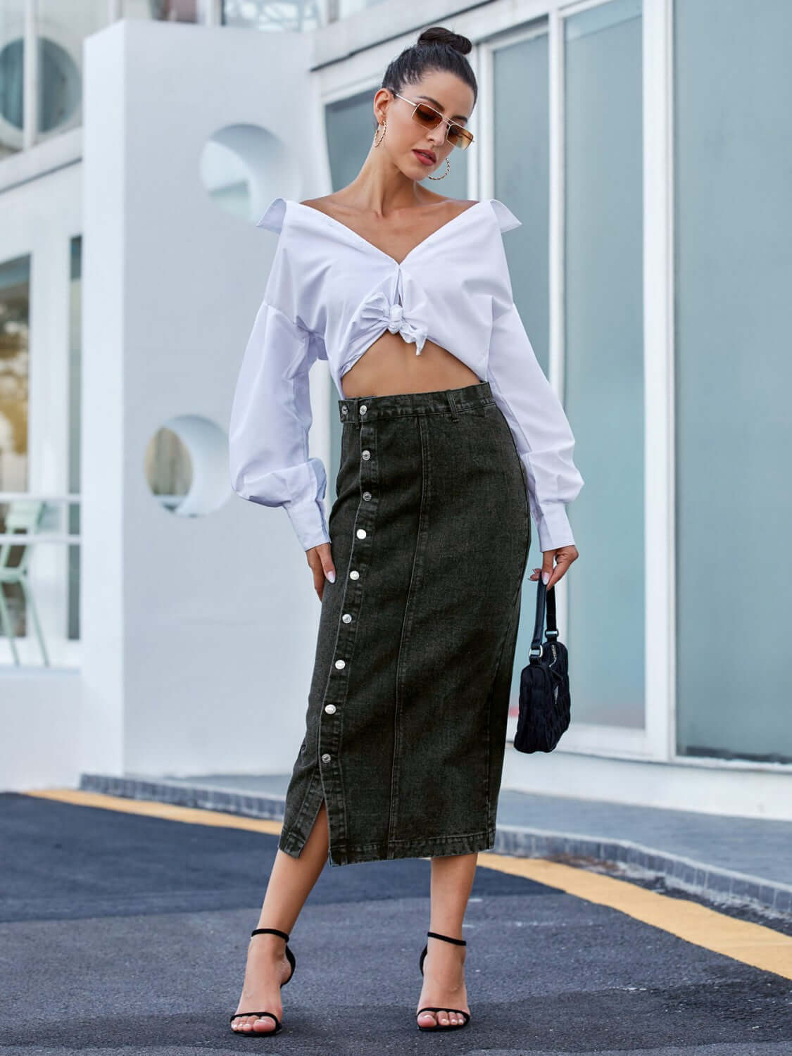 Female model wearing Black Button Down Denim Skirt 