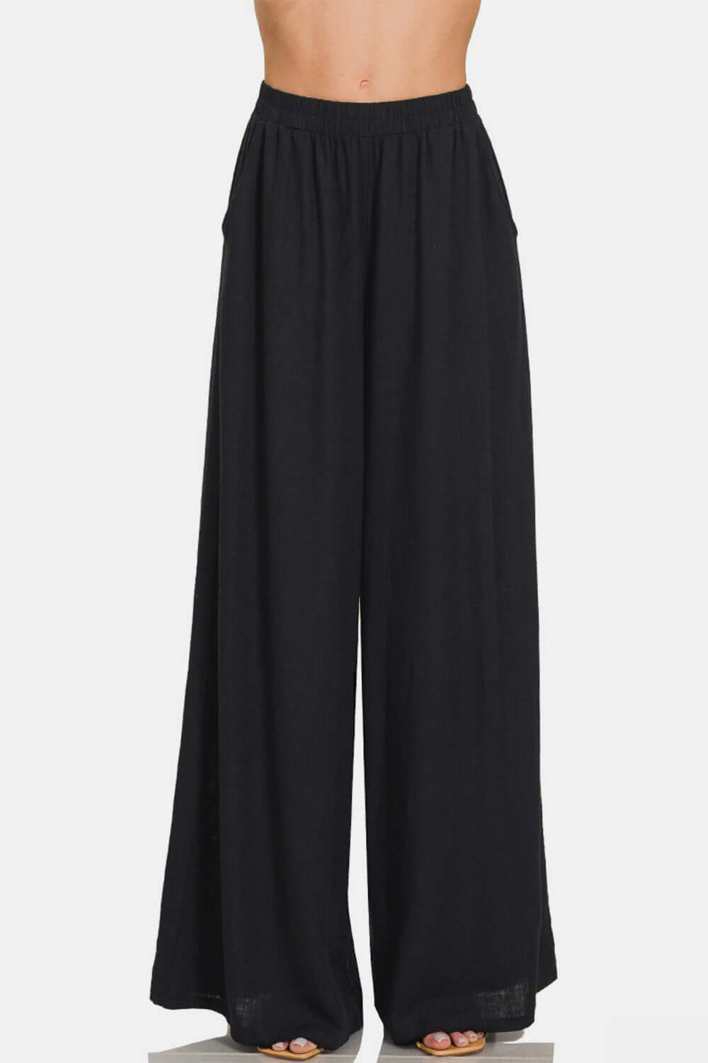 Female model wearing Black Zenana Linen Pants Wide Leg