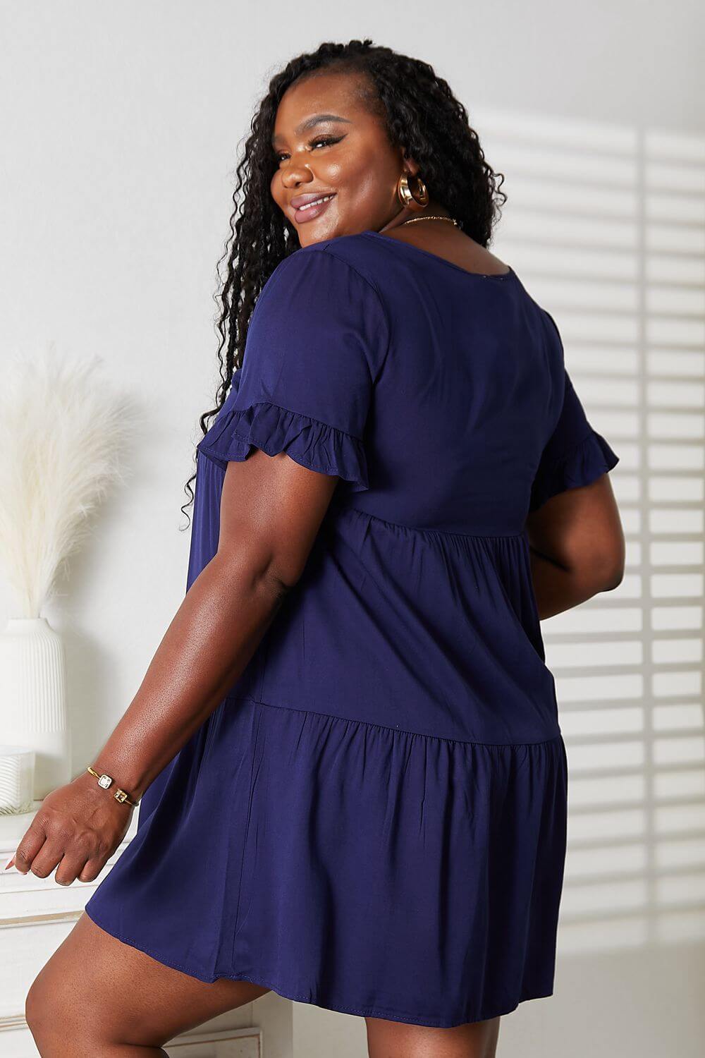 Plus size model wearing Dark Blue V-Neck Tiered Dress Flounce Sleeve