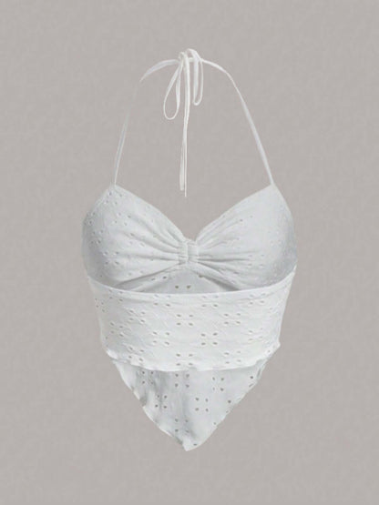Eyelet Halter Neck Cami in white, featuring a stylish halter design and eyelet detailing for summer outfits.