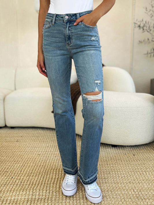 Female model wearing Judy Blue Distressed Denim Jeans Medium