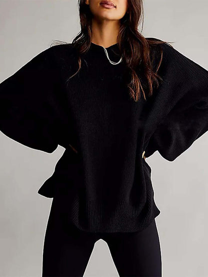 Female model wearing Knit Top Round Neck Long Sleeve Sweater Black by Saflore