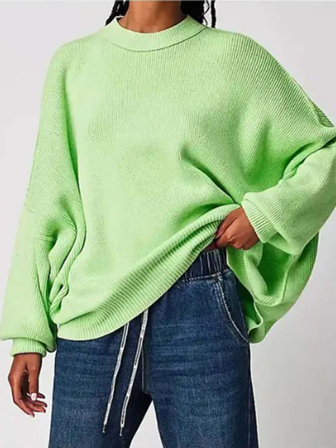 Female model wearing Knit Top Round Neck Long Sleeve Sweater Neon Green