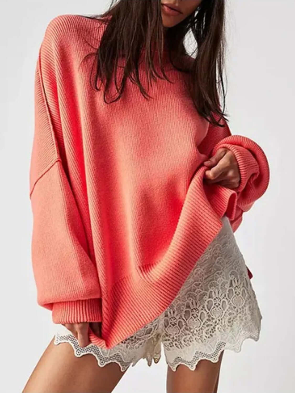 Female model wearing Knit Top Round Neck Long Sleeve Sweater Orange Red