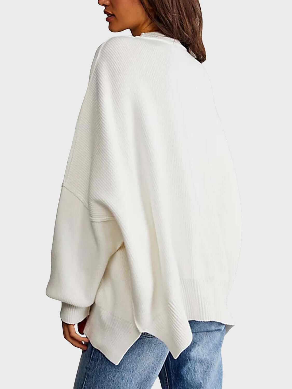 Female model wearing Knit Top Round Neck Long Sleeve Sweater White by Saflore