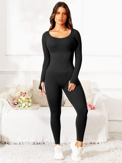 Female model wearing Long Sleeve Active Jumpsuit Scoop Neck Black