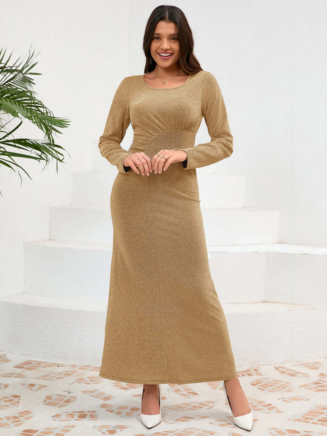 Female model facing front wearing a Long Sleeve Maxi Dress Gold