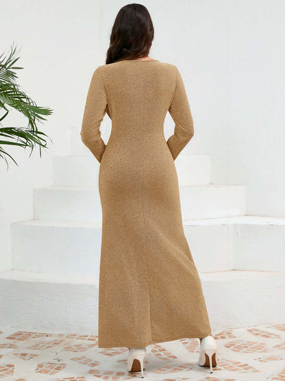 Female model facing backwards wearing a Long Sleeve Maxi Dress Gold