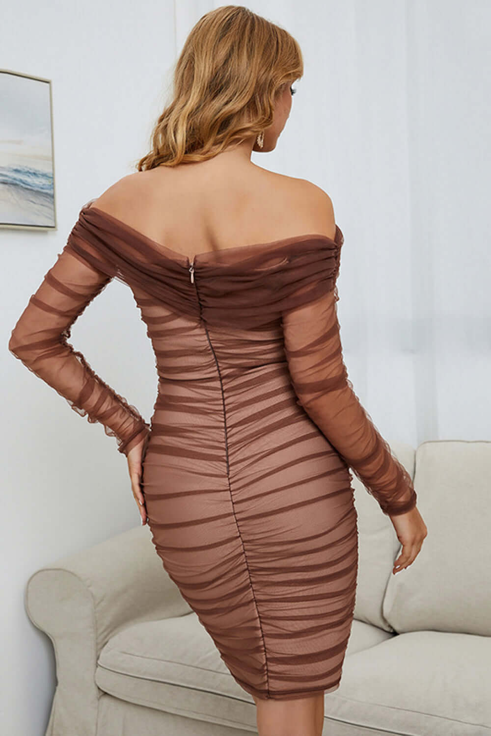 Female model facing backwards wearing Long Sleeve Tulle Dress Off-Shoulder Ruched Mauve by Saflore