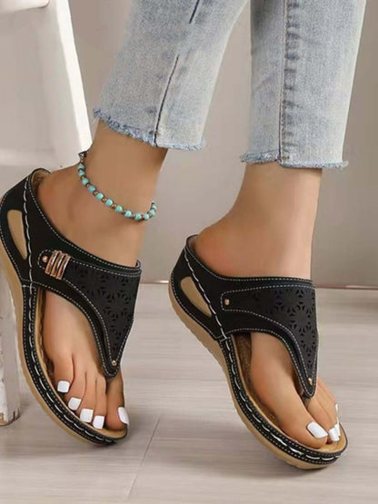 Stylish PVC sandals paired with denim jeans, perfect for summer vibes and trendy outings.