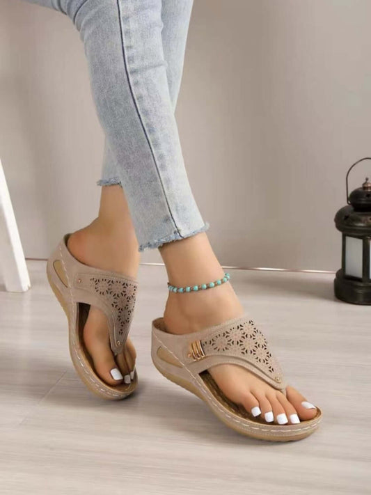 Stylish PVC sandals paired with light denim jeans, showcasing summer comfort and chic vibes.