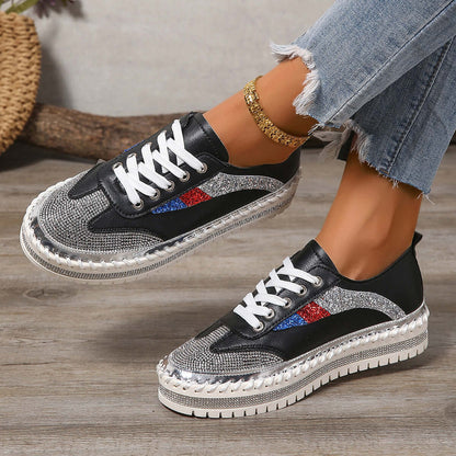 Rhinestone sneakers with black and silver design, featuring red and blue accents, perfect for stylish comfort.