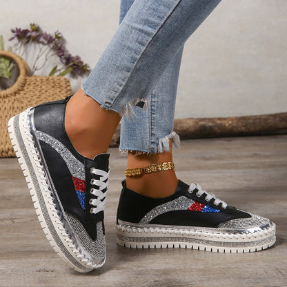 Stylish black rhinestone sneakers with colorful accents, perfect for a chic and comfortable look.