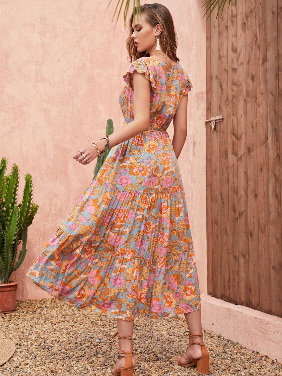 Woman wearing tiered maxi dress