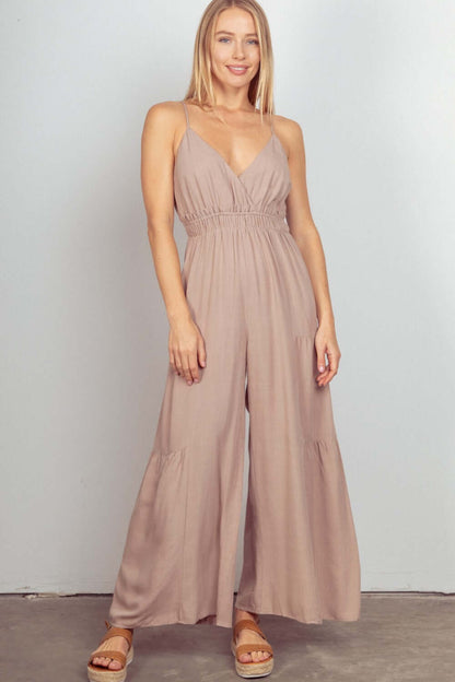 Female model wearing VERY J Sleeveless Wide Leg Jumpsuit Natural