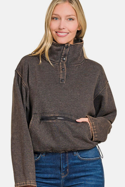 Female model wearing Zenana Acid Wash Sweatshirt With Pockets Fleece Half Snap Ash Black