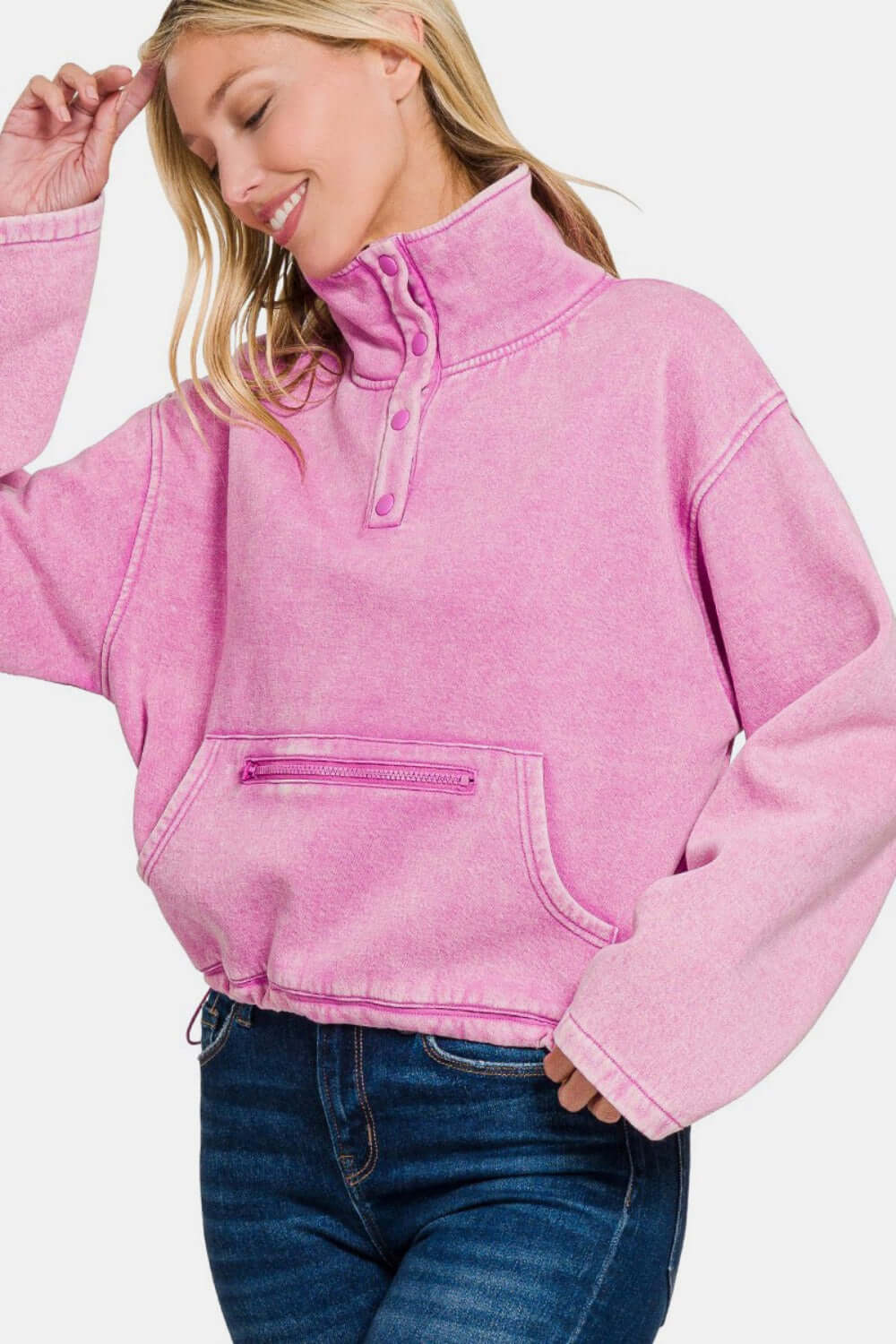 Female model wearing Zenana Acid Wash Sweatshirt With Pockets Fleece Half Snap Mauve