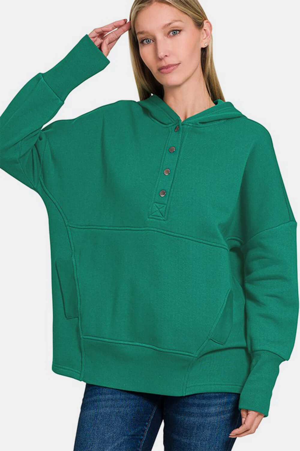 Female model wearing a Zenana Hoodie Dark Green