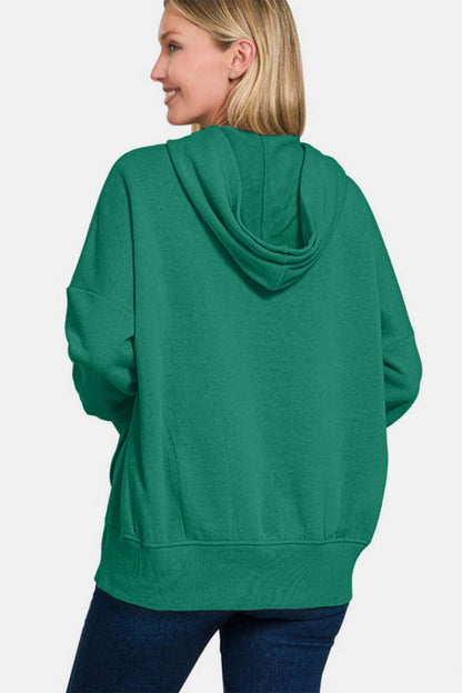 Female model facing backwards wearing a Zenana Hoodie Dark Green