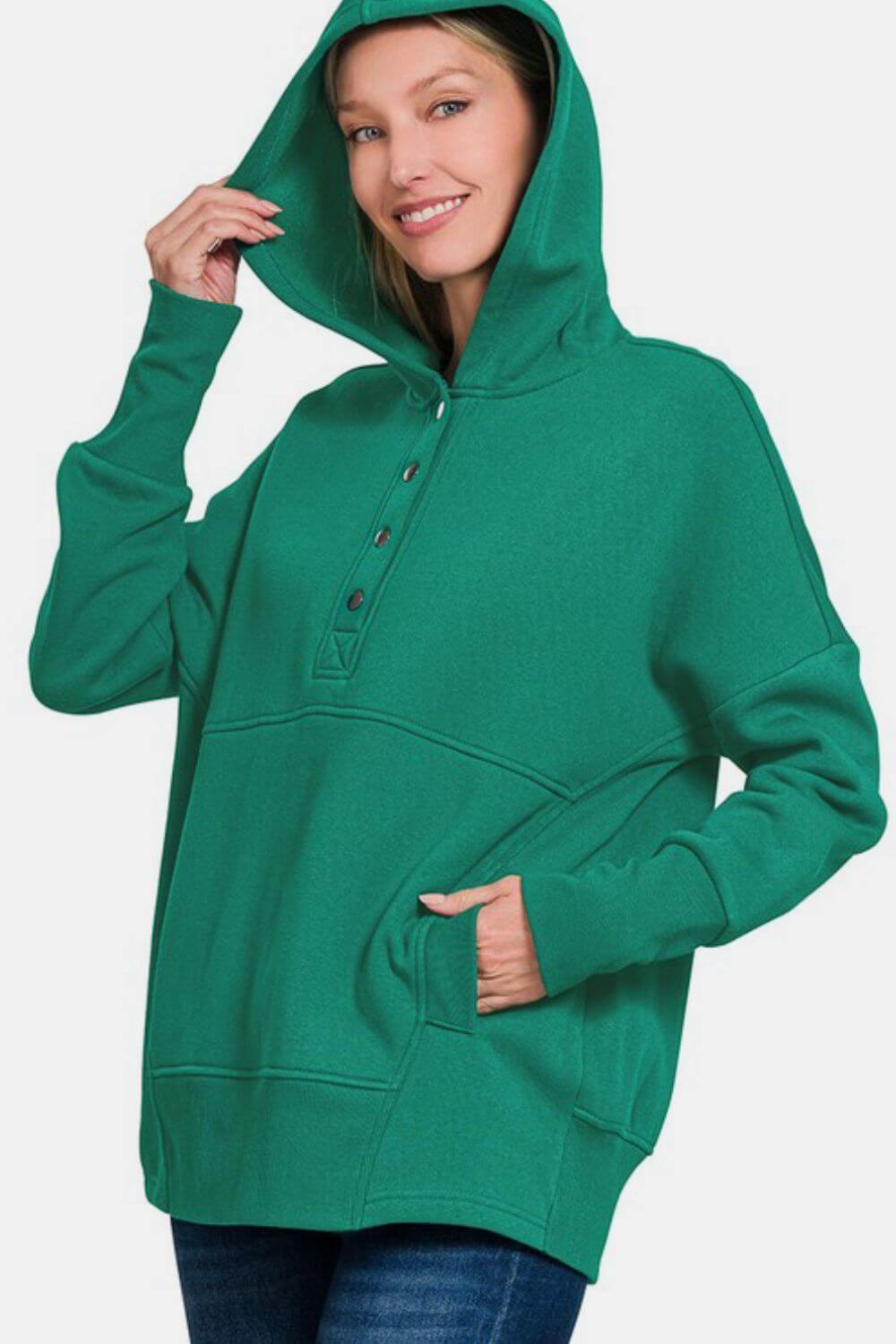 Female model posing, wearing a Zenana Hoodie Dark Green