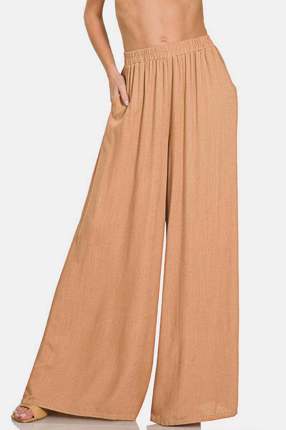 Female model wearing Zenana Linen Pants Wide Leg Dark Brush